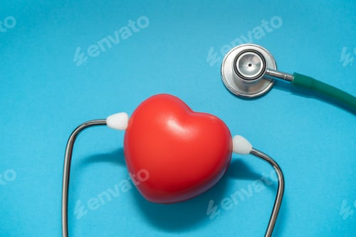 Preview: Stethoscope with red heart on blue background