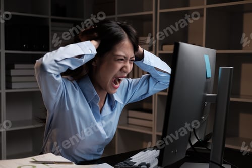 Preview: Stressful young Asian business woman having a mental breakdown after working too much, working overt
