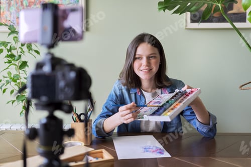 Preview: Art workshop online, teenage girl drawing with watercolors