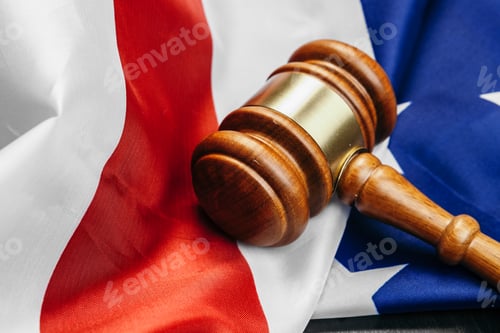 Preview: Judge gavel on the background of the flag united states of America