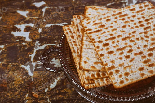 Preview: Matzo on wooden table jewish matza on Passover unleavened bread