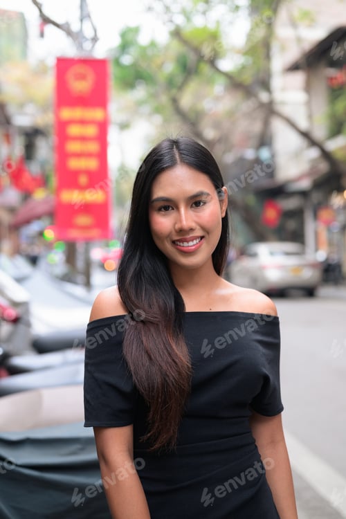 Preview: Young Asian Woman in Black Off-Shoulder Dress on Hanoi Street