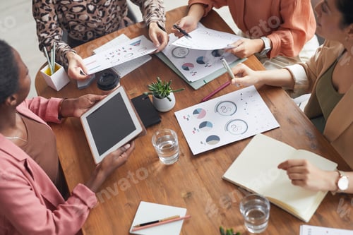 Preview: Team of Businesswomen Brainstorming at Meeting