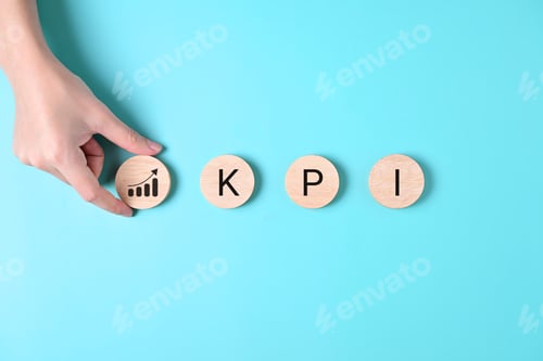 Preview: Key performance indicator, Businessman holding wooden cube with KPI