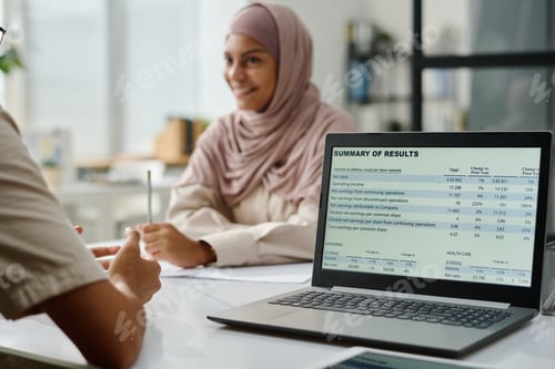 Preview: Financial data on screen of laptop