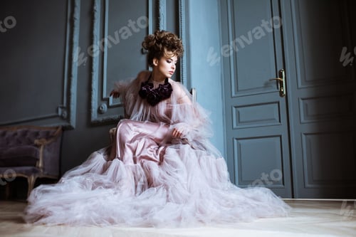 Preview: Fashionable female portrait of cute lady in pink dress indoors