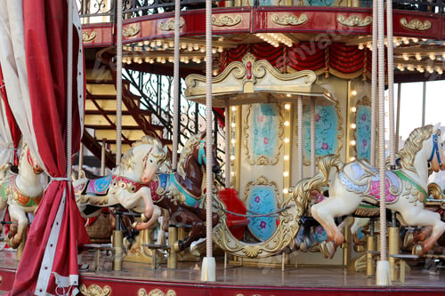 Preview: animals roundabout carousel in amusement park. family weekend or vacations