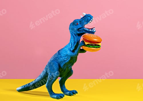 Preview: Happy blue dinosaur holding burger on pink and yellow background.