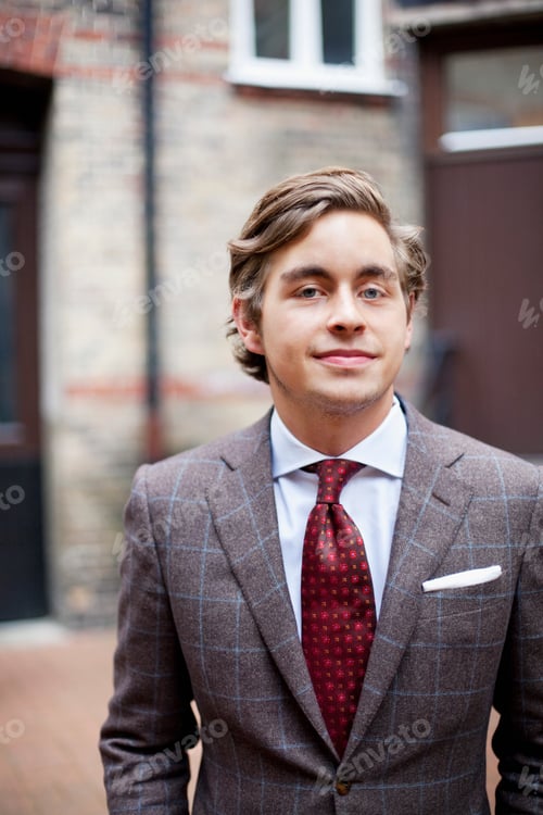 Preview: Portrait of confident handsome fashion designer wearing suit