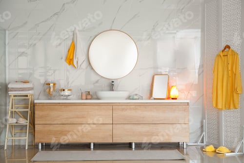 Preview: Modern bathroom interior with vessel sink and round mirror