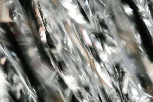 Preview: Abstract atmospheric background of tinsel with bokeh.