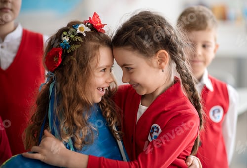 Preview: Schoolchildren welcoming new Ukrainian classmate, concept of enrolling Ukrainian kids to schools