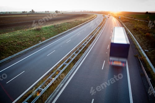 Preview: highway traffic - motion blurred truck on a highway/motorway/spe