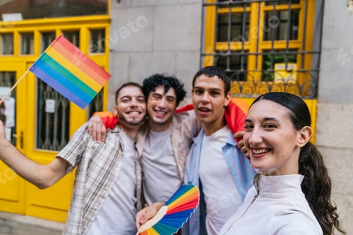 Preview: Diverse friends celebrating pride month holding rainbow flag