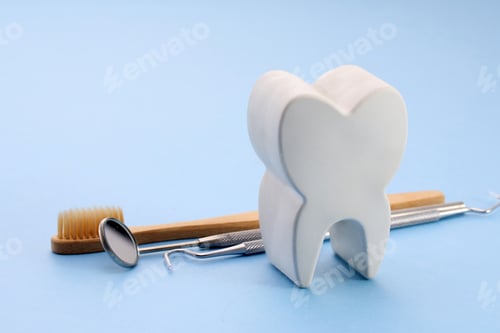 Preview: Dental Tools with Tooth Model. National Dentists Day.