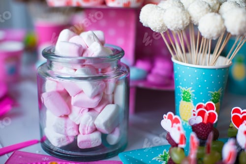 Preview: Marshmallow, sweet colored meringues, popcorn, custard cakes and cake pops on table