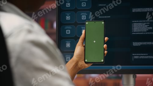 Preview: Woman using isolated screen smartphone and AI LLM chatbot on computer