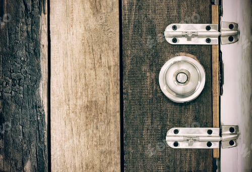 Preview: Old lock on the door of an old farmhouse . true village style . close-up. focus on lock.
