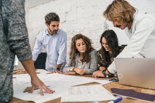 Preview: Young team of coworkers making great work discussion in modern c