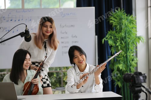 Preview: Women musical band playing instruments in background. Online home studio plays and sing a song.