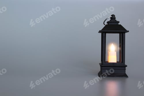 Preview: Lantern with burning candle glowing