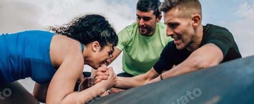 Preview: Woman in an obstacle course climbing a drum