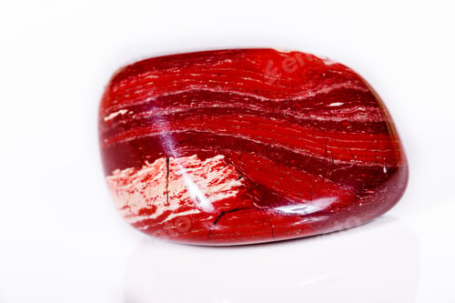 Preview: Macro mineral stone jasper "zebra iron" on a white background