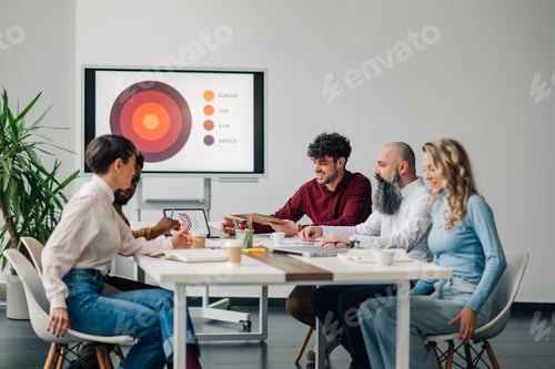 Preview: Marketing managers discussing global strategy during business meeting