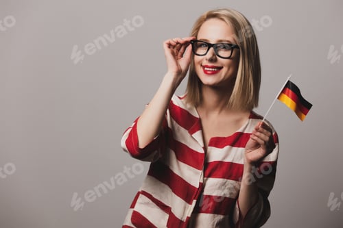 Preview: beatiful girl holds German flag