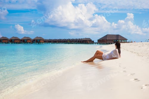 Preview: Young woman enjoy tropical beach vacation