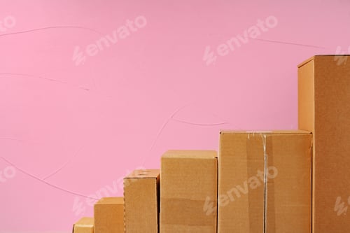 Preview: Set of cardboard boxes on pink background