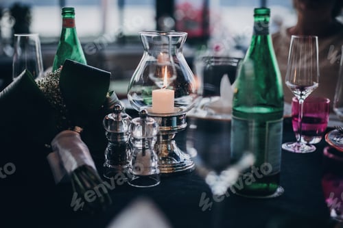 Preview: Wedding table with candles, cutlery and plates, champagne drink and glasses