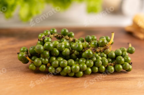 Preview: Fresh pepper seeds on the wooden table.