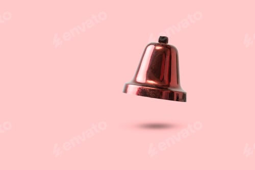 Preview: a christmas red bell decoration isolated against color background