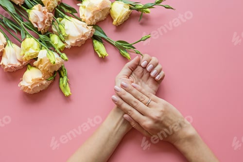 Preview: Nominated Woman hands manicure manicured nails gel polish fashion nude pink flowers skin care