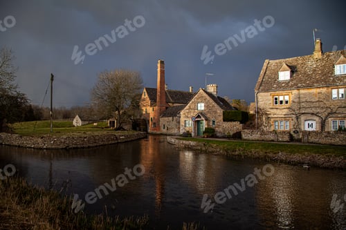 Preview: Beautiful shot of the chimney and mill in Lower Slaughter village, Cotswolds region, England