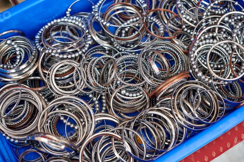 Preview: Baskets with batch of kara sikh steel bangles for sale in Gurudwara Bangla Sahib temple
