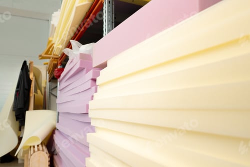 Preview: Stacked sheets of foam rubber for furniture production in factory workshop