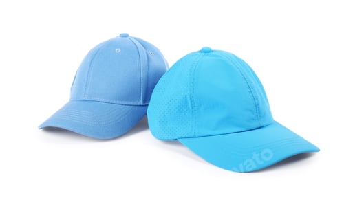 Preview: Light blue baseball caps isolated on white. Mockup for design