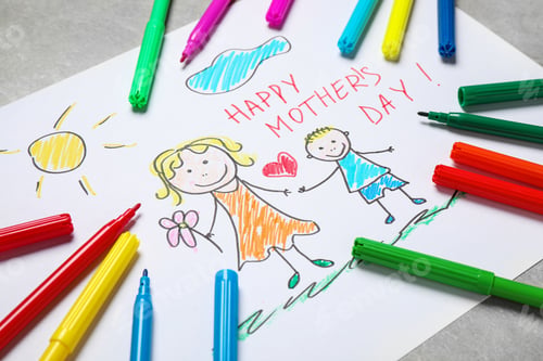 Preview: Handmade greeting card for Mother's Day and felt tip pens on grey table, closeup