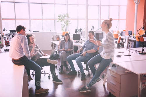 Preview: Young Business Team At A Meeting at modern office building