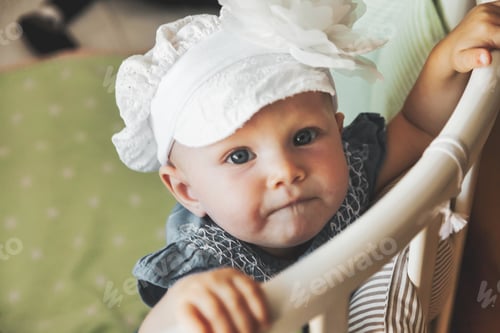 Preview: Adorable baby with beauty eyes wear blue shirt and stylish hat