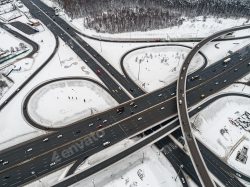 Preview: Aerial view of a freeway intersection Snow-covered in winter.
