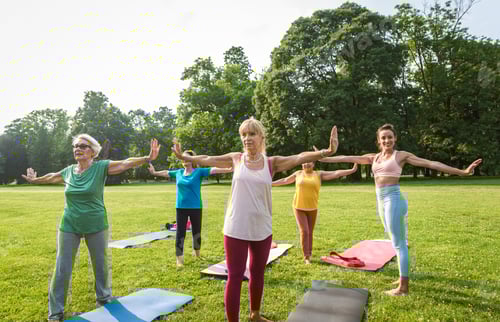 Preview: Senior women training with fitness coach at park