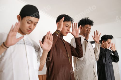 Preview: Side View Of Young Men Praying Salah Together Doing Takbir On First Procedure At The Mosque