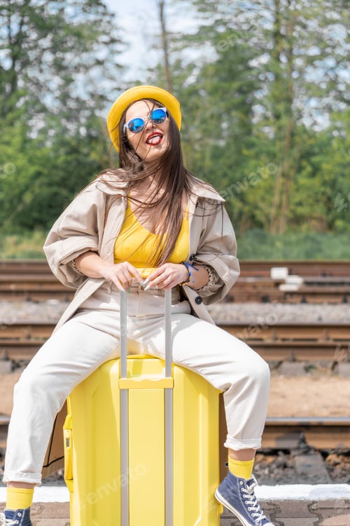 Preview: Young Woman Ready for Summer Travel Outdoors