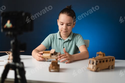 Preview: Young boy video blogger making stream with his followers
