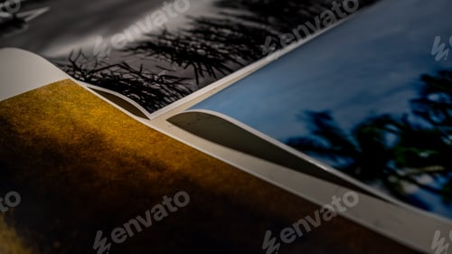 Preview: Closeup shot of printed monochrome and color photographs