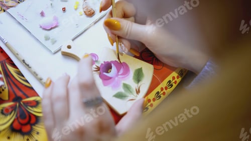 Preview: Hands weaving the bottom of a straw basket. ART. A man weaves a round part of straw and twigs with