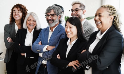 Preview: Business people having fun inside office - Focus on man with grey hair